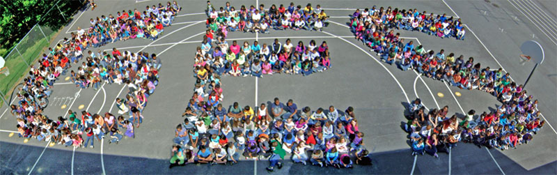 Aerial photo of GES students spelling out G...E...S.